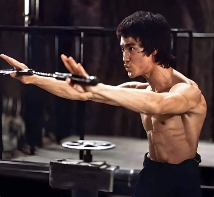 How did Bruce Lee train for strength?