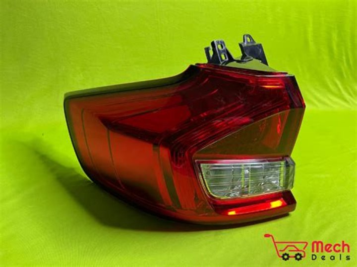 How do you clean a tail light cover?