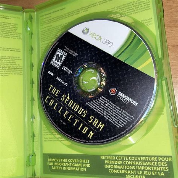 How do you clean a Xbox 360 game disc?