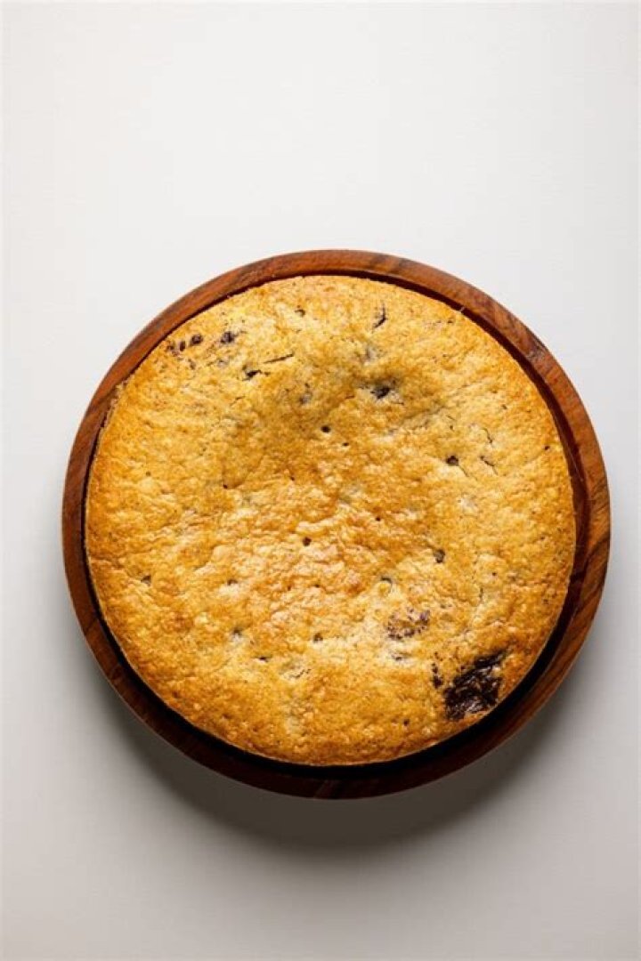 How do you keep chocolate chips from sinking in a cake?