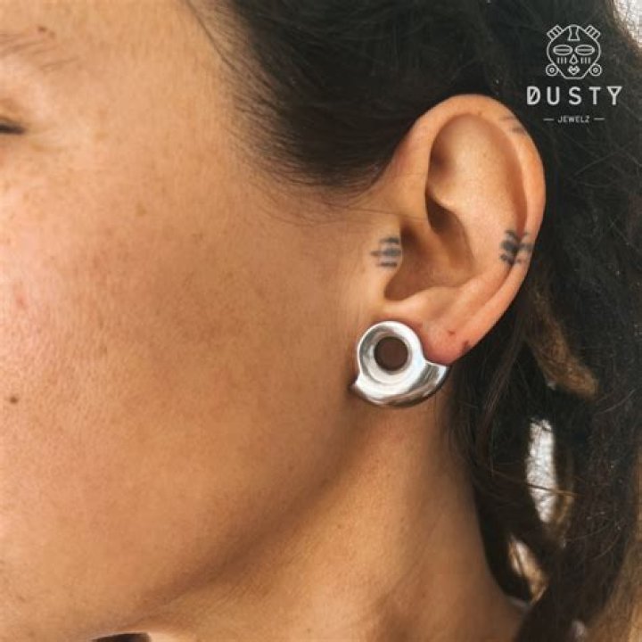 How long until I can wear double flared plugs?