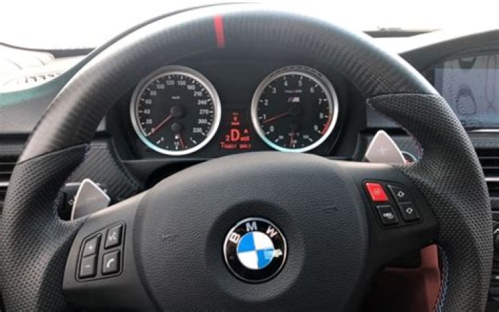 What causes a steering wheel to be off center?