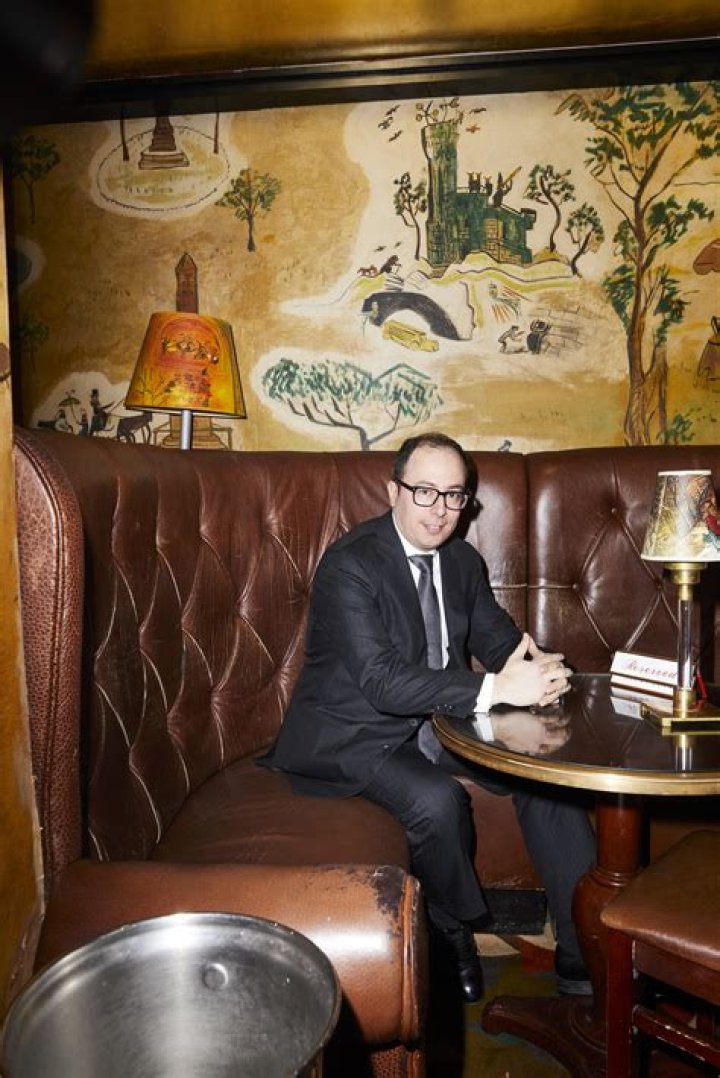 What does a maitre d do at a restaurant