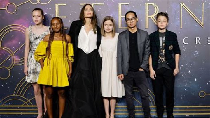 What does Angelina Jolie DCMG mean?