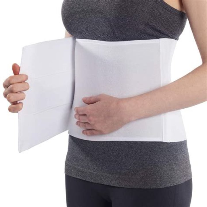 What is an abdominal binder used for?
