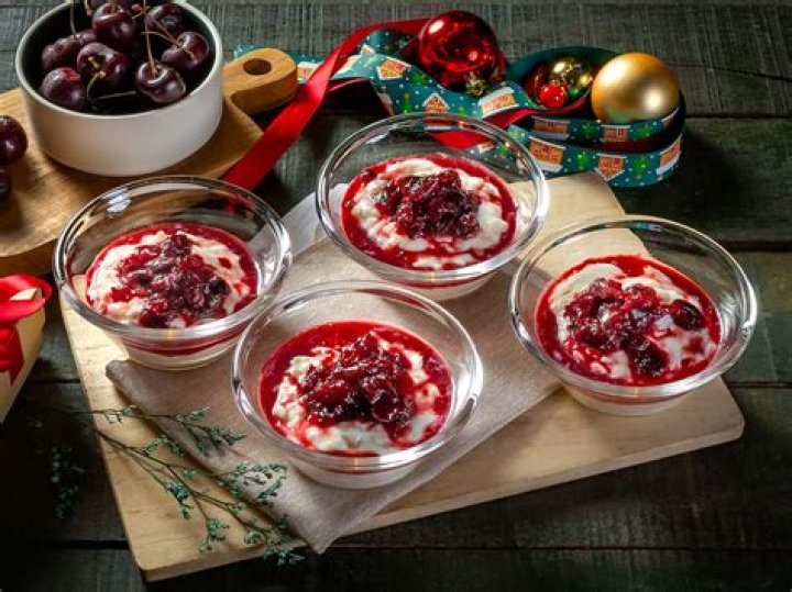 What is hidden inside the Christmas rice pudding in Denmark?