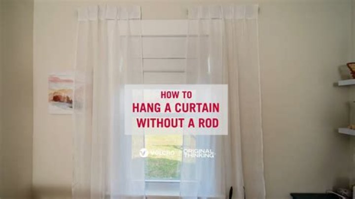 Where do you hang a curtain rod above a window?