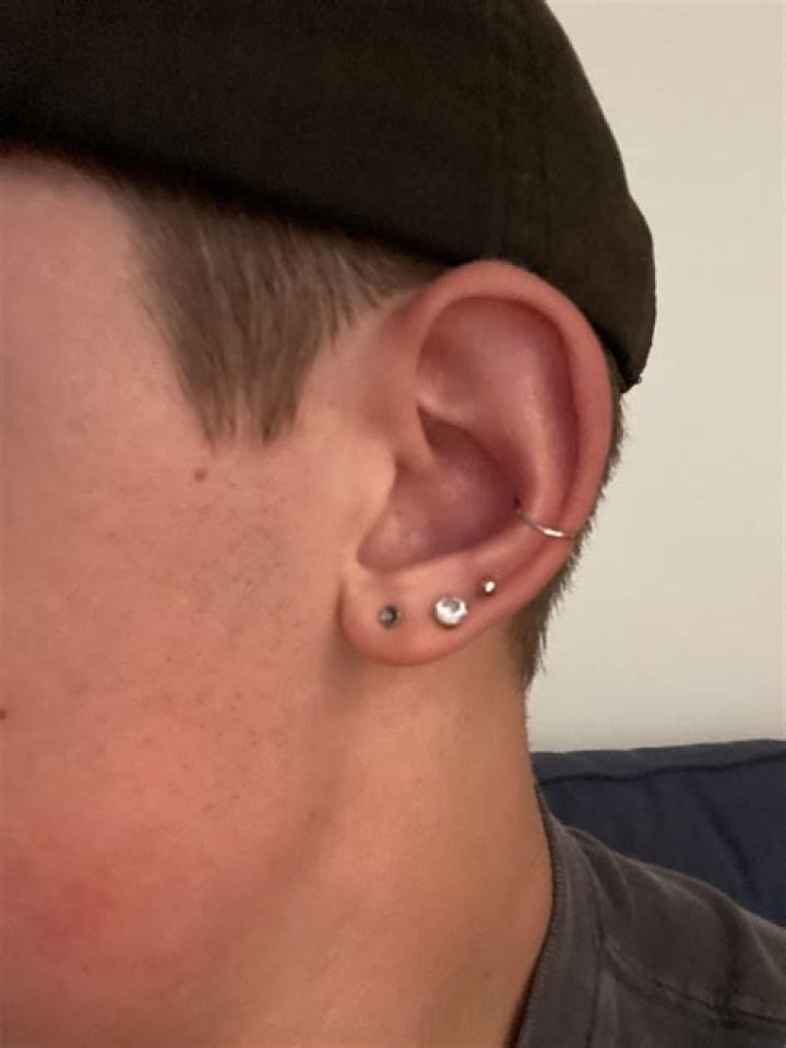 Which ear should a boy get pierced?