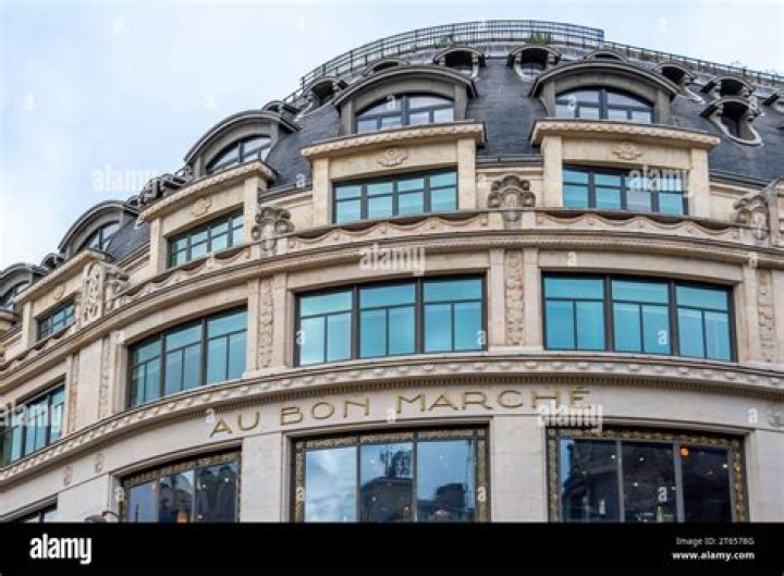 Who owns Bon Marche in Paris?